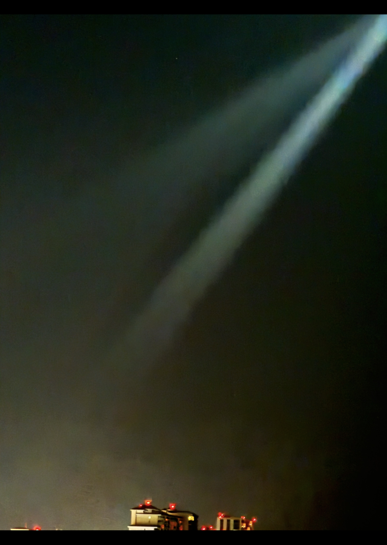 The bright southwest arm of light reaching across the night sky, soft and forking